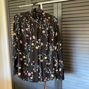 Beautiful semi-sheer black floral blouse